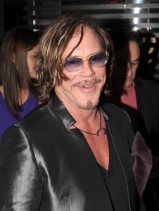 Actor Mickey Rourke and guest arrive on New Year's Eve at Fontainebleau