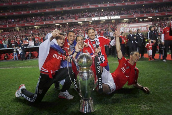 Benfica's players celebrate with the trophy after beating Olhanense and winning the Portuguese Premier League title at Luz stadium in Lisbon