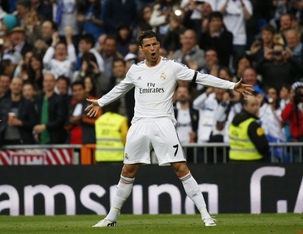 Real Madrid's Cristiano Ronaldo celebrates his goal against Osasuna during their Spanish First Division soccer match at Santiago Bernabeu stadium in Madrid