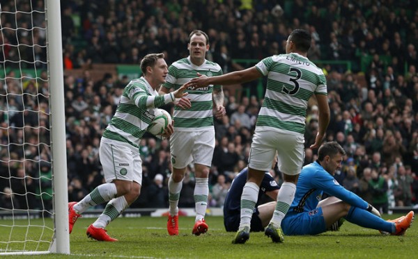 Celtic's Commons celebrates his goal with Stokes and Izaguirre during their Scottish Premier League soccer match against Ross County in Glasgow