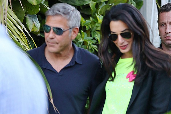 George Clooney and his lawyer fiancee hold hands in Malibu