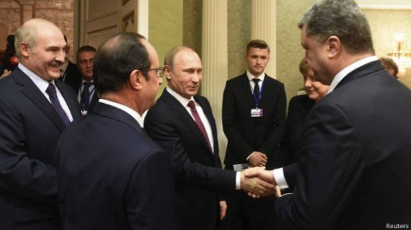 150211203138_putin_poroshenko_minsk_handshake_624x351_reuters