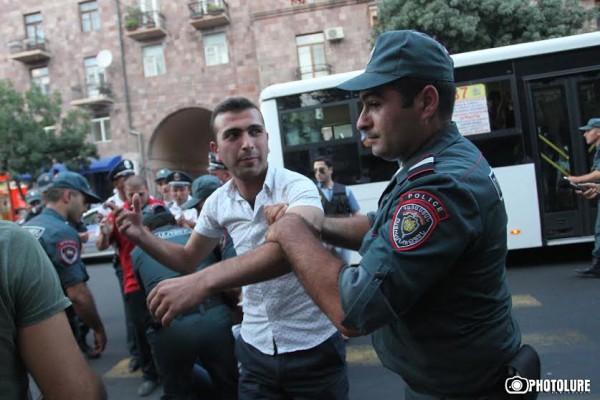 Protesters hold a civil disobedience