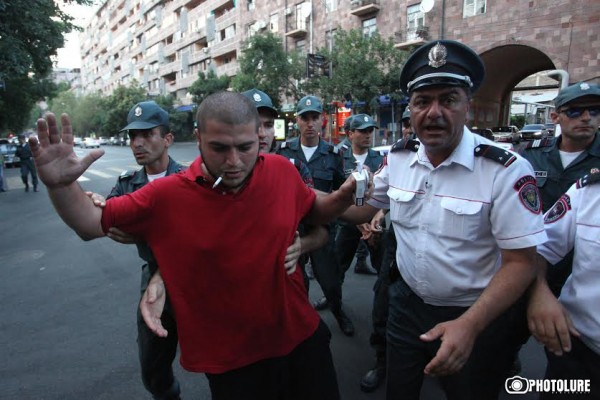 Protesters hold a civil disobedience