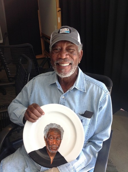 MANDATORY CREDIT: Jacqueline Poirier/REX Shutterstock. Only for use in this story. Editorial Use Only. No stock, books, advertising or merchandising without photographer's permission Mandatory Credit: Photo by REX Shutterstock (5168139a) Morgan Freeman holding his plate, painted by Jacqueline Poirier Celebrity Plate Paintings, Toronto, Canada - 24 Sep 2015 FULL BODY: http://www.rexfeatures.com/nanolink/r4c4 A Canadian artist paints portraits of celebrities onto plates.  Jacqueline Poirier is the Resident Artist at Toronto's Ritz-Carlton. Her work is showcased throughout the hotel's restaurant, and aside from celebrity portraits range from landscapes, food and animals.