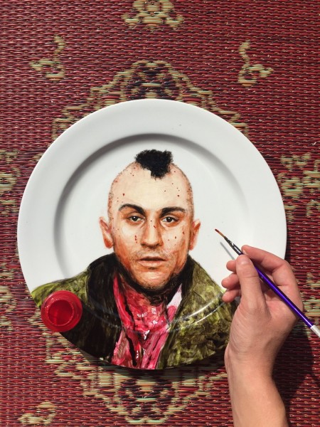 MANDATORY CREDIT: Jacqueline Poirier/REX Shutterstock. Only for use in this story. Editorial Use Only. No stock, books, advertising or merchandising without photographer's permission Mandatory Credit: Photo by Jacqueline Poirier/REX Shutterstock (5168139h) Robert Ne Niro's portrait on a plate by Jacqueline Poirier Celebrity Plate Paintings, Toronto, Canada - 24 Sep 2015 FULL BODY: http://www.rexfeatures.com/nanolink/r4c4 A Canadian artist paints portraits of celebrities onto plates.  Jacqueline Poirier is the Resident Artist at Toronto's Ritz-Carlton. Her work is showcased throughout the hotel's restaurant, and aside from celebrity portraits range from landscapes, food and animals.