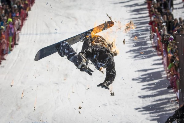 A snowboarder performs during the Red Bull Jump and Freeze competition at ski resort Shimbulak outside Almaty, March 22, 2015.  REUTERS/Shamil Zhumatov
