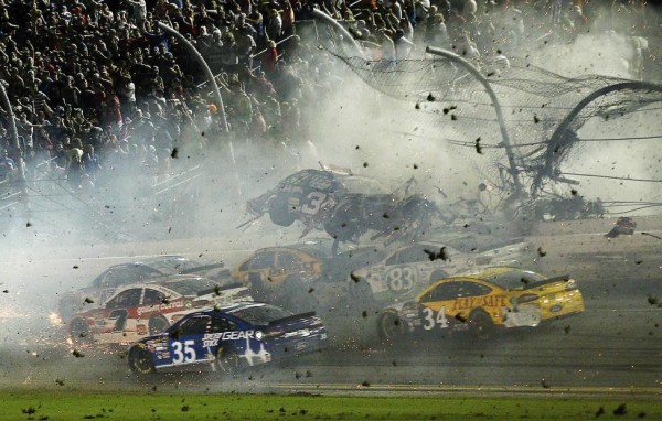 NASCAR Sprint Cup Series driver Austin Dillon car (3) crashes against the catch fence during the finish of the Coke Zero 400 at Daytona International Speedway, July 6, 2015.  Reinhold Matay-USA TODAY Sports