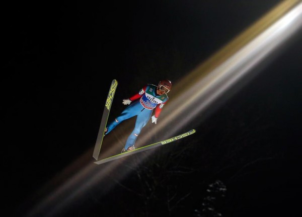 Stefan Kraft from Austria soars through the air during the first round for the final jumping of the 63rd four-hills Ski jumping tournament in Bischofshofen, Austria, January 6, 2015. REUTERS/Dominic Ebenbichler