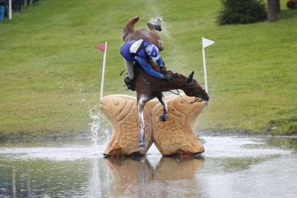 Russia's Mikhail Nastenko riding Reistag falls at the Lochan fence in the cross country event of FEI European Eventing Championship at Blair Castle, Scotland, Britain, September 12, 2015. REUTERS/Russell Cheyne