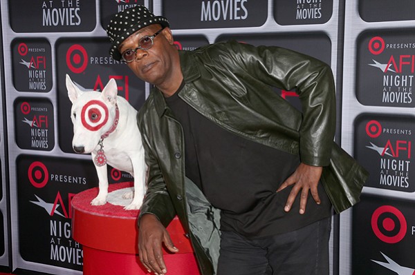 HOLLYWOOD, CA - APRIL 24:  Actor Samuel L. Jackson (R) and Bullseye arrive on the red carpet for Target Presents AFI's Night at the Movies at ArcLight Cinemas on April 24, 2013 in Hollywood, California.  (Photo by Frederick M. Brown/Getty Images)