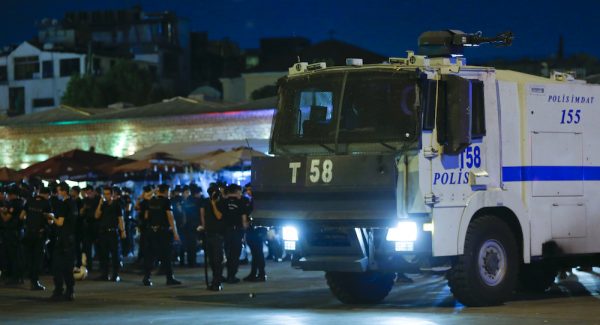 Turkish police officers stand by a car near the Taksim Square in Istanbul, Turkey, July 15, 2016.   REUTERS/Murad Sezer - RTSI6WS