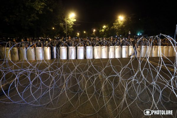 On the 14th day of the occupation of Patrol-Guard Service Regiment of Erebuni district by 'Sasna Tsrer' group, protesting people marched to Baghramyan Avenue in Yerevan, Armenia, but the police prevent them