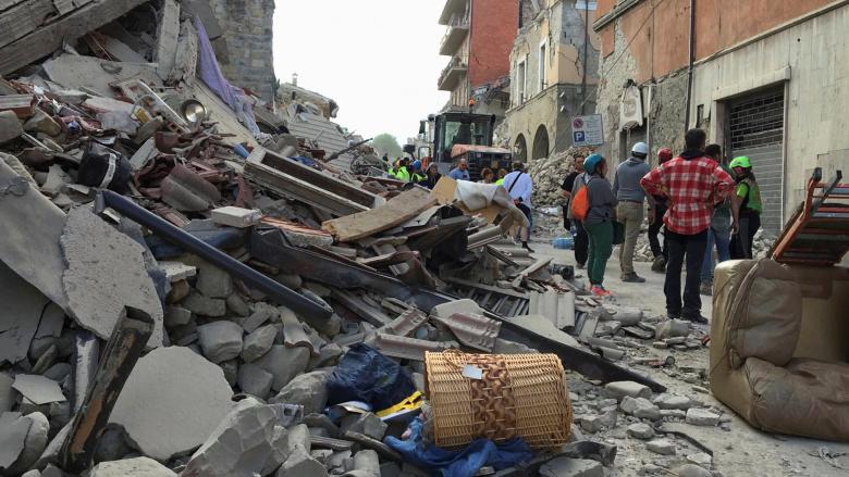 Rescuers work following an earthquake that hit Amatrice, central Italy, August 24, 2016. REUTERS/Emiliano Grillotti