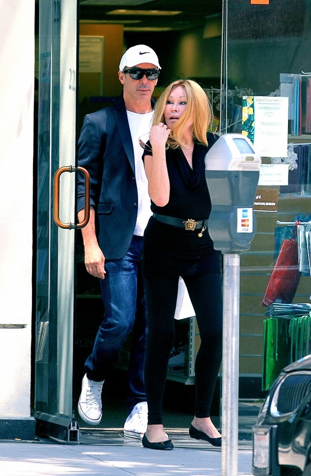 Lloyd Klein with Jocelynne Wildenstein leaving a store in Beverly Hills